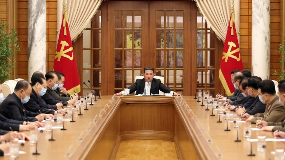 Image shows Kim Jong Un at meeting